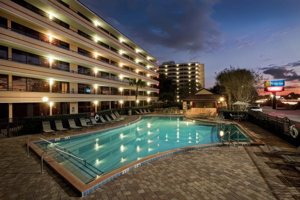 Swimming pool at the hotel with the building being reflected off the pool at evening time