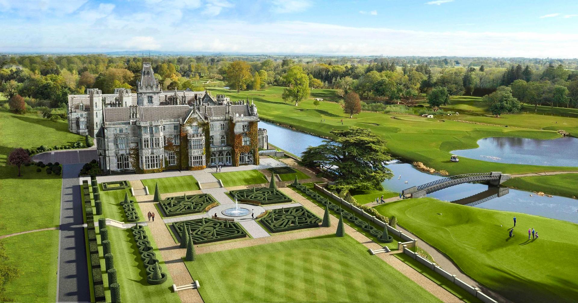 Expansive aerial shot of the castle and intricate gardens.