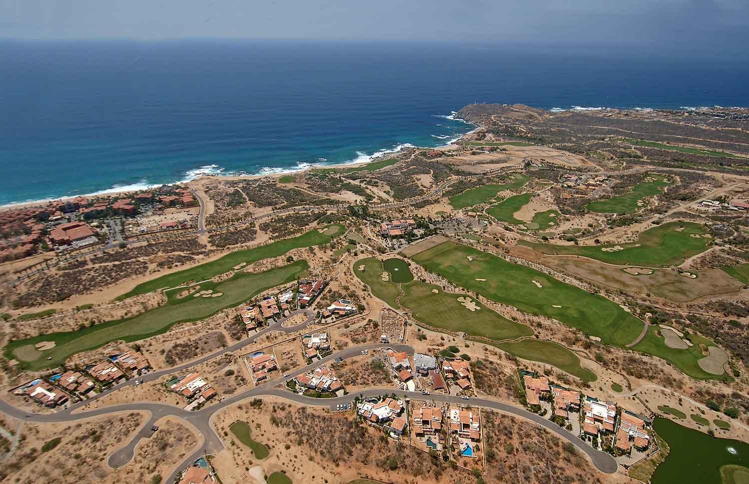 Birdseye view of the Cabo del Sol Golf course littered with wide fairways and sand bunkers