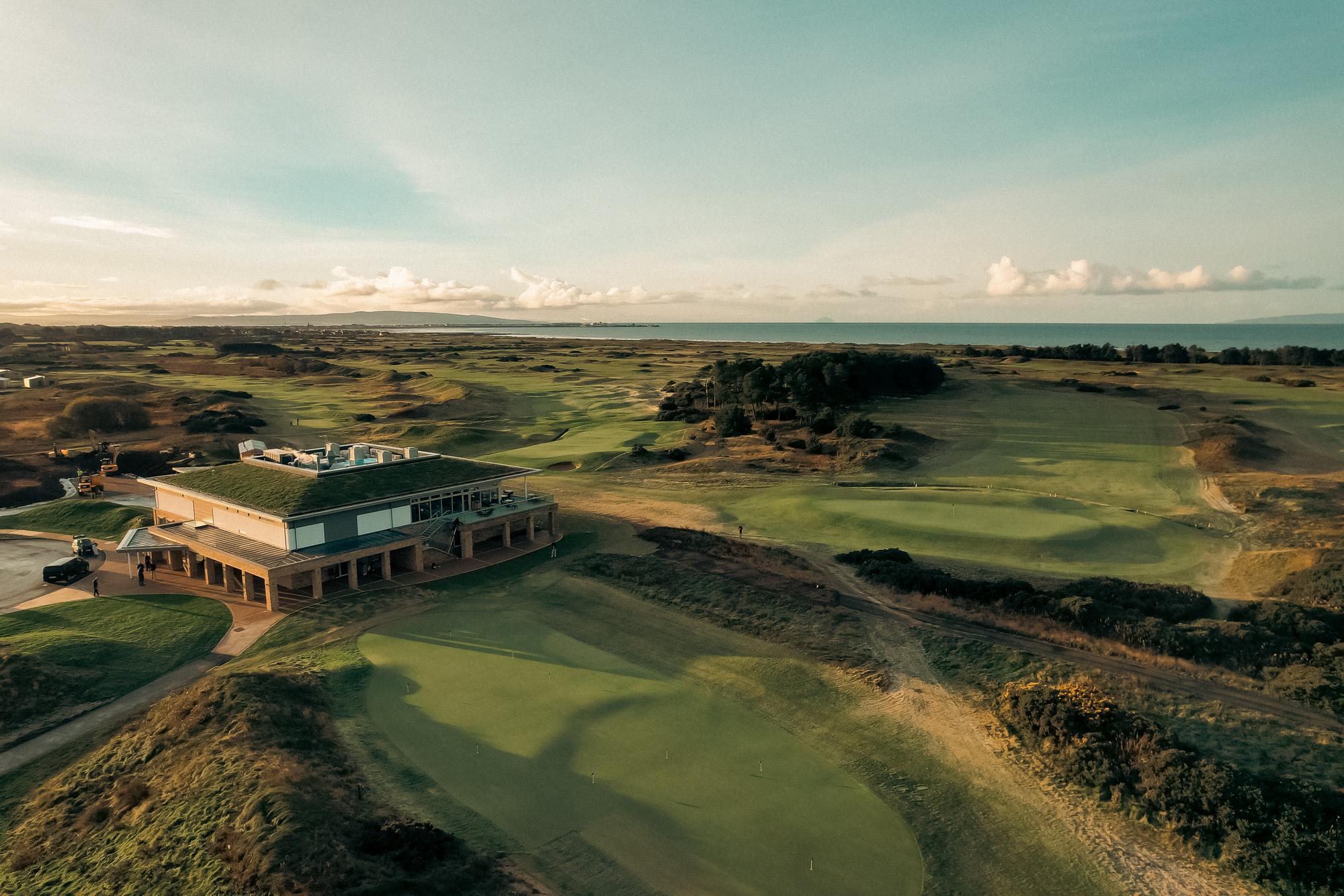 A stunning aerial view of Dundonald Links with the modern clubhouse at the heart of the course.