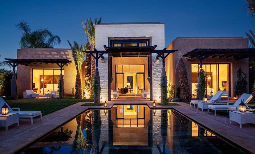 A villa at the Fairmont Royal Palm Marrakech with its own personal pool surrounded by sunbeds