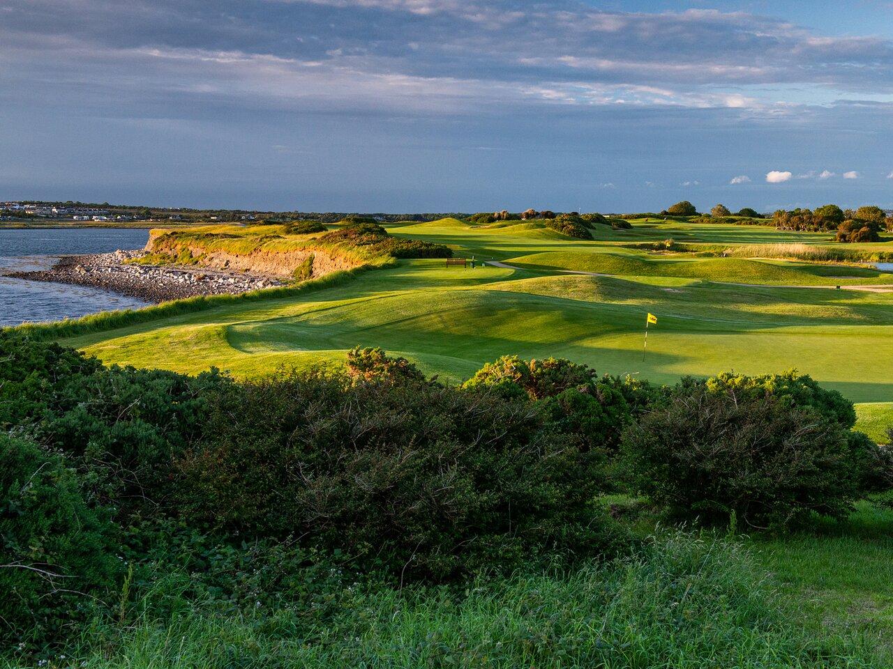 Hilly greens surrounding a flagstick which represents a hole at the Galway course