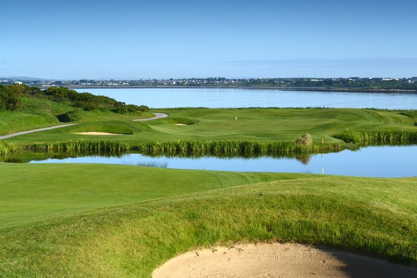 Lush greens which overlook a body of water