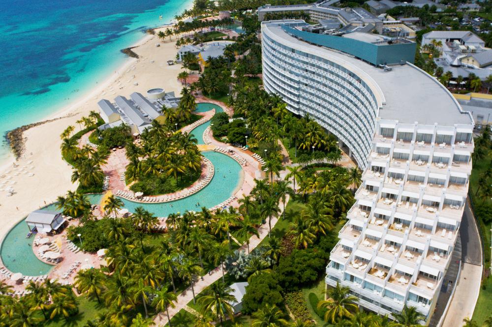 Birdseye view of the resort featuring their winding swimming pool with easy beach access