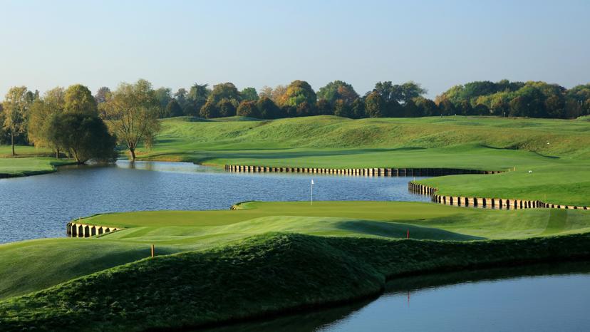 Undulating green surrounded by water