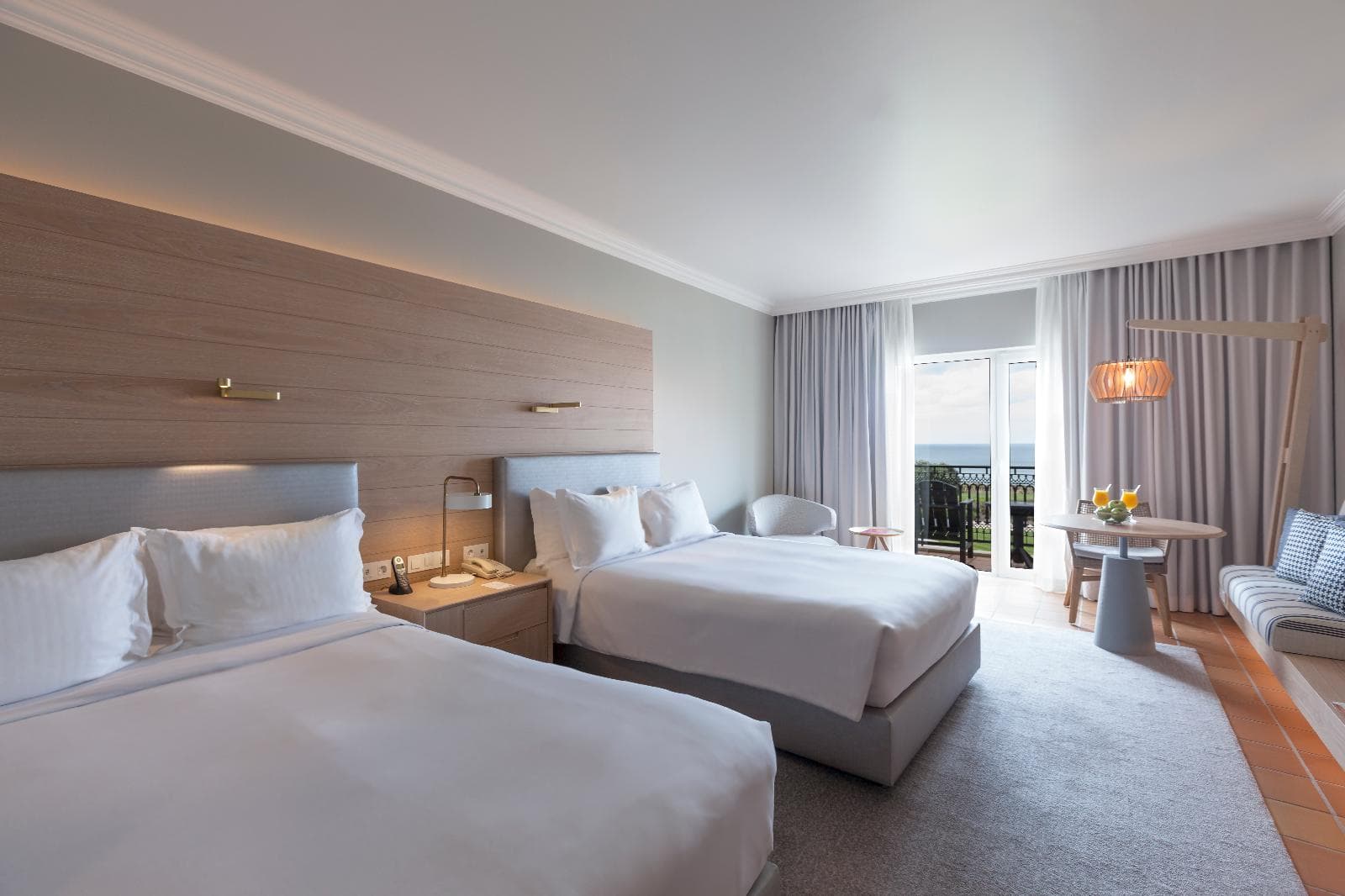 Two Double beds with a balcony in a Double Room