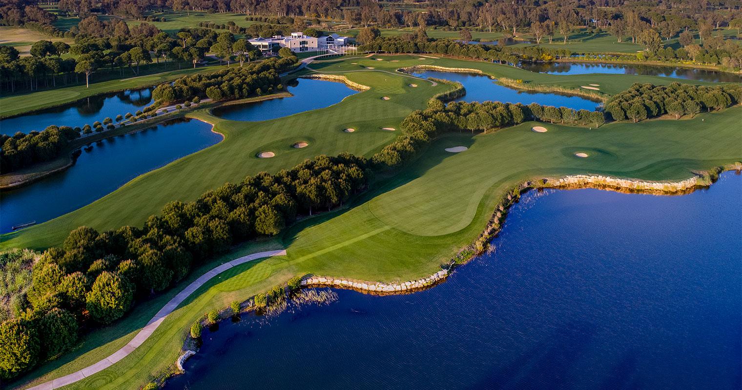 Narrow fairways with water hazards either side