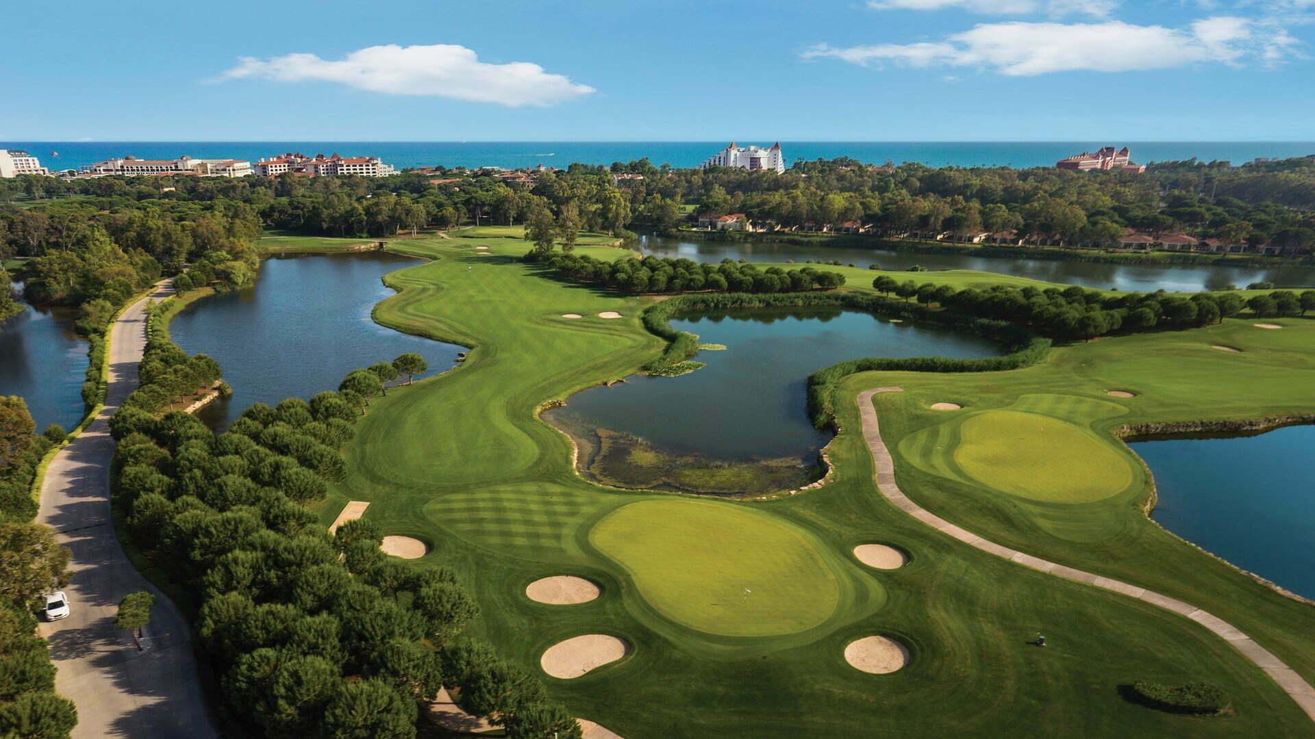 Narrow, winding fairways flanked by water hazards