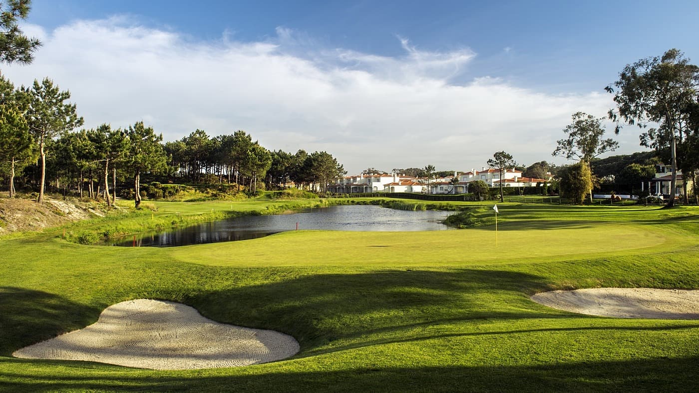 Green with a water hazard in front