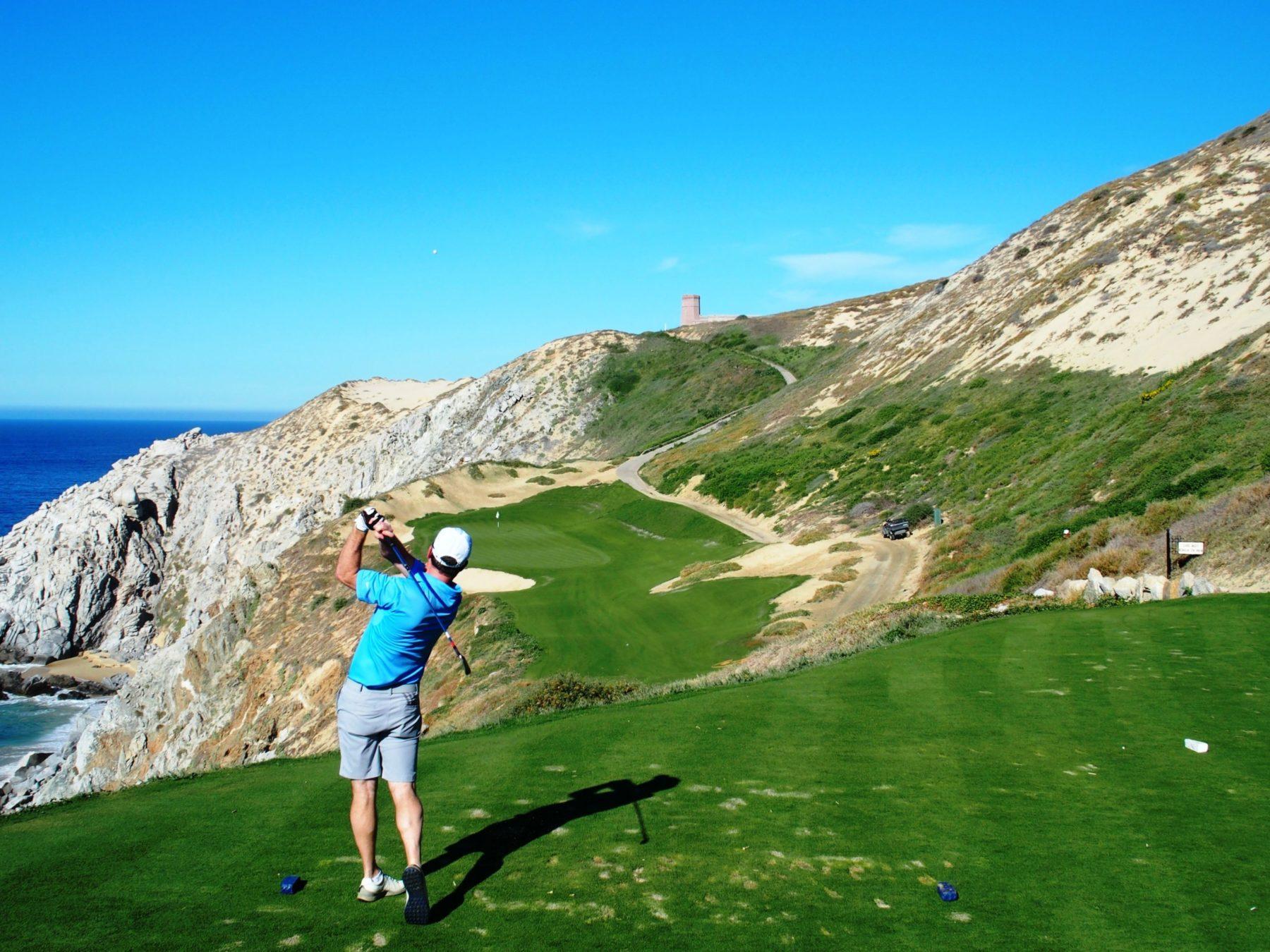 Gentleman enjoying his round of golf on the mountainous course