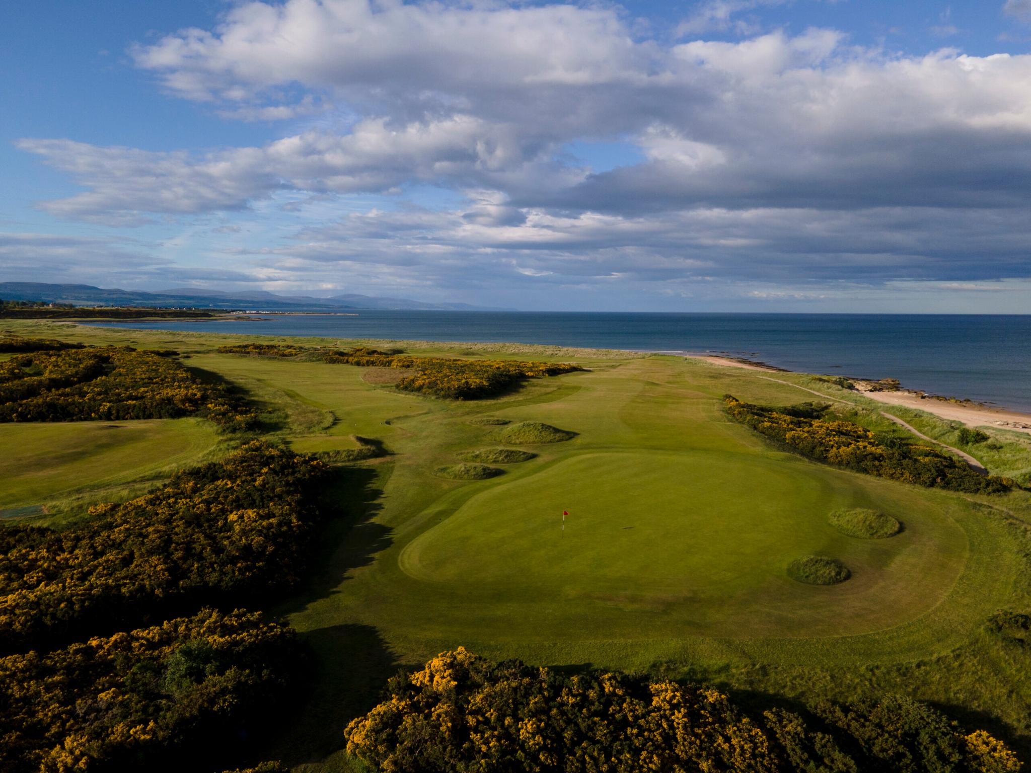 Aerial view of the course running along the coastline.