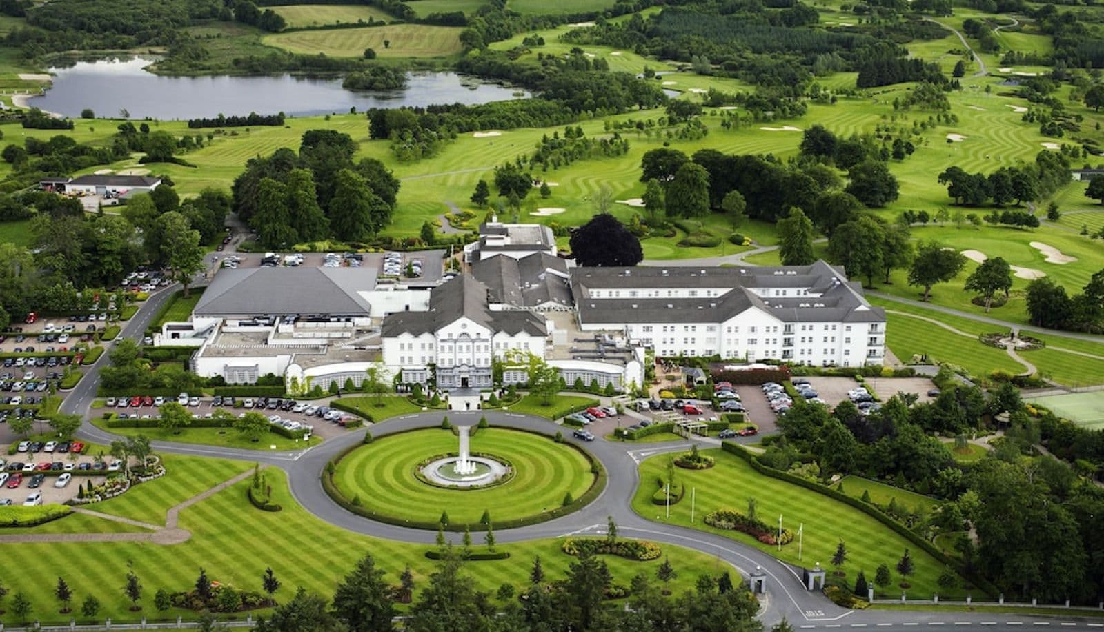 Birds-eye view of the main building at Slieve Russell showing off its clubhouse, accommodation and golf course