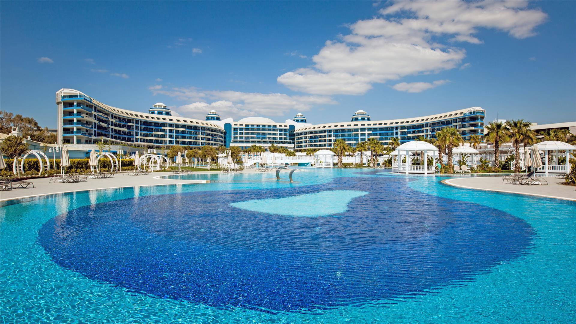 View of the outdoor swimming pools overlooked by the hotel
