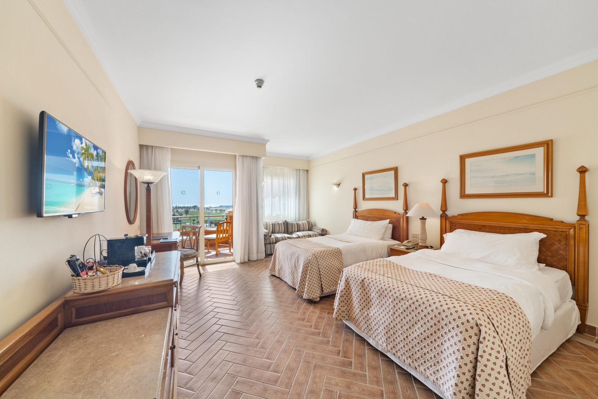Double and single bed twin room at the resort