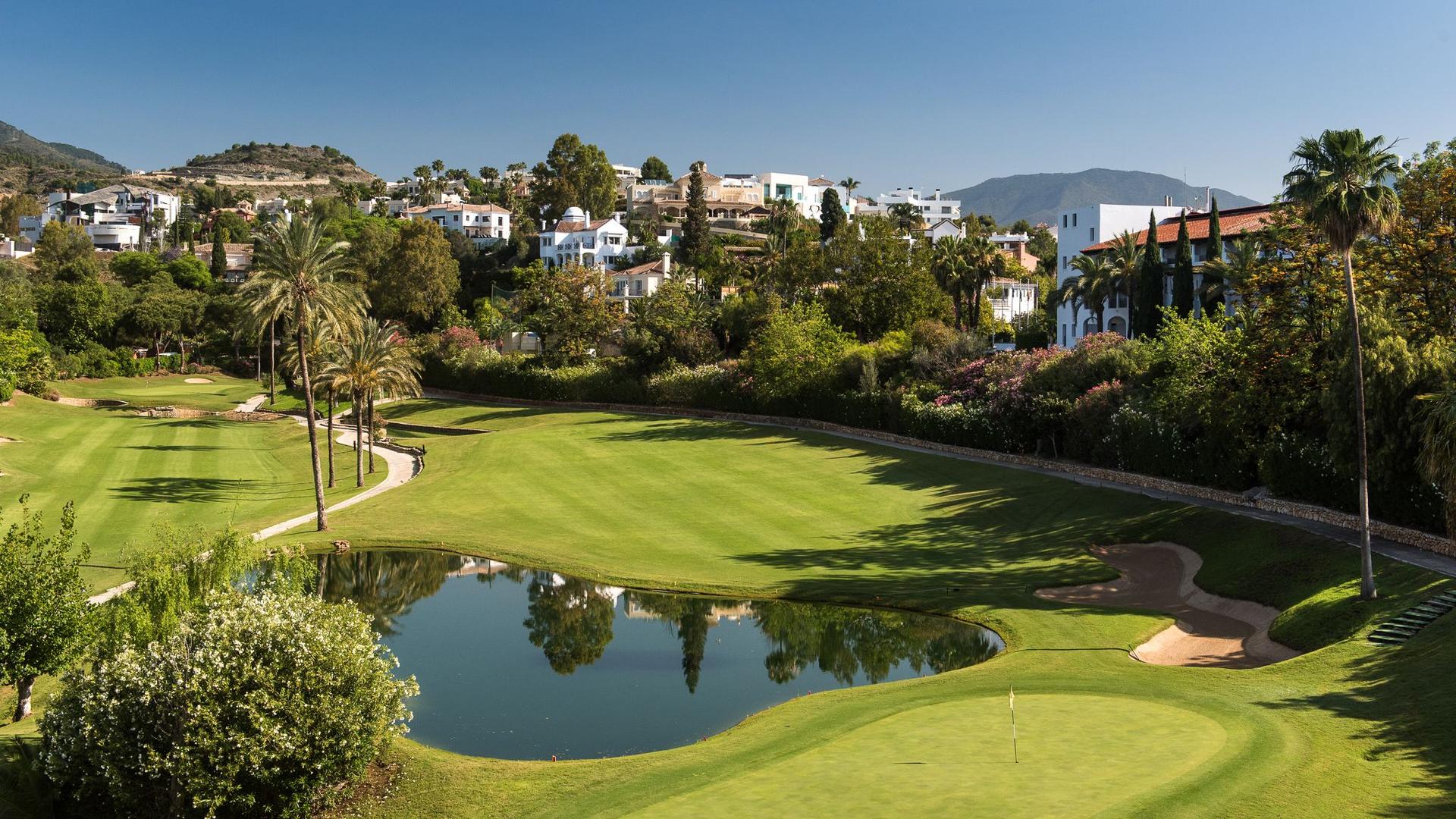 Aeiral view of pristine fairway with The Westin La Quinta Hotel in the background