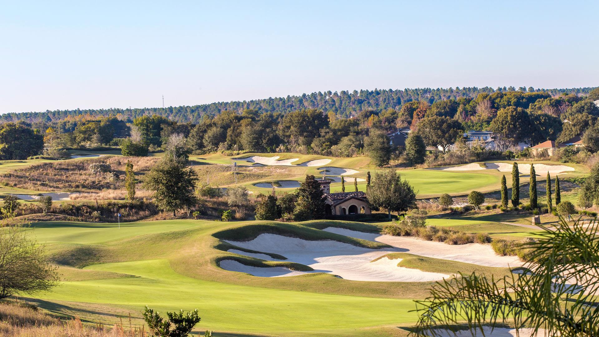 Overhead view of an elevated green next to a large sand bunker