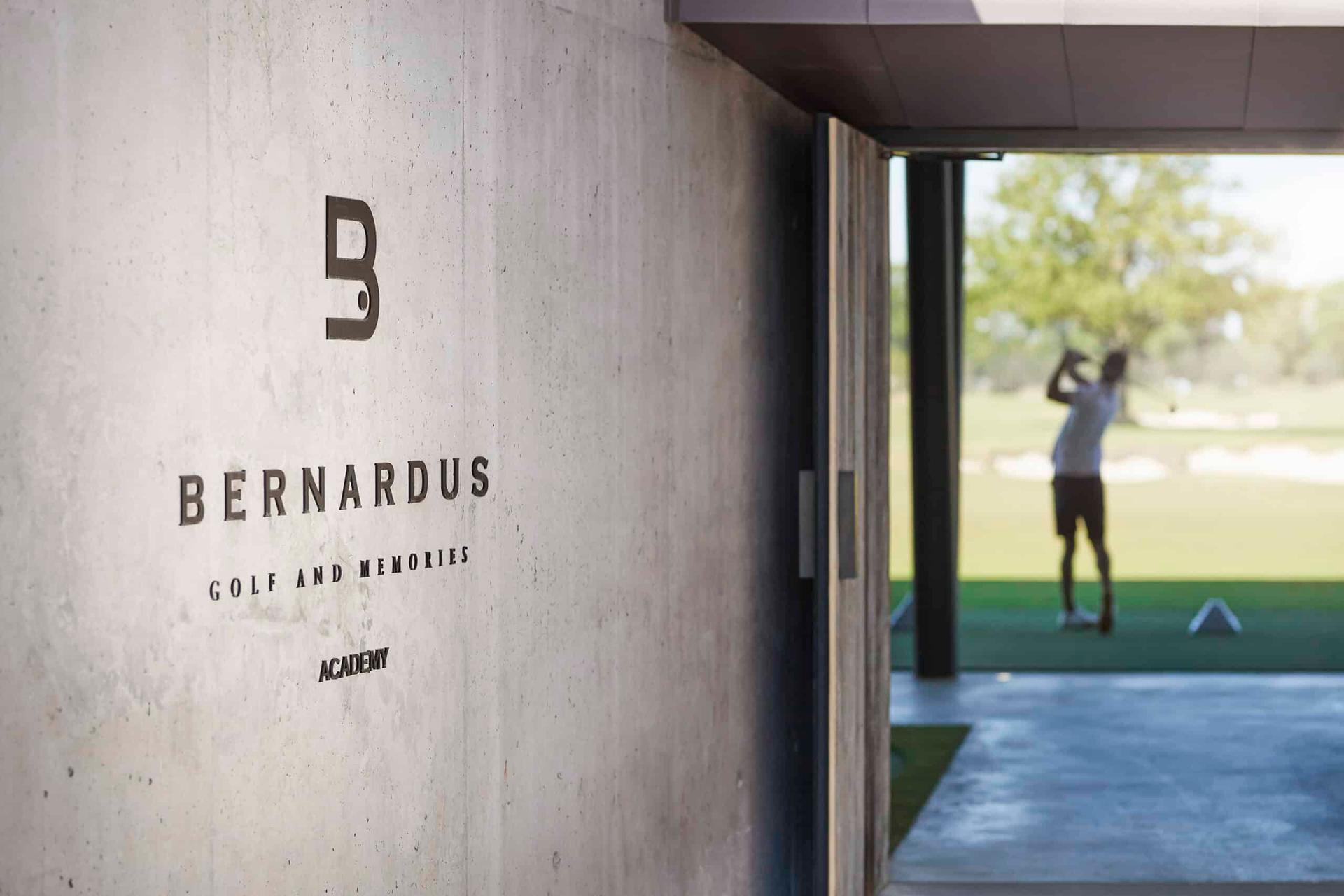 The Bernardus Lodge & Golf name nestled into the wall leading to the driving range