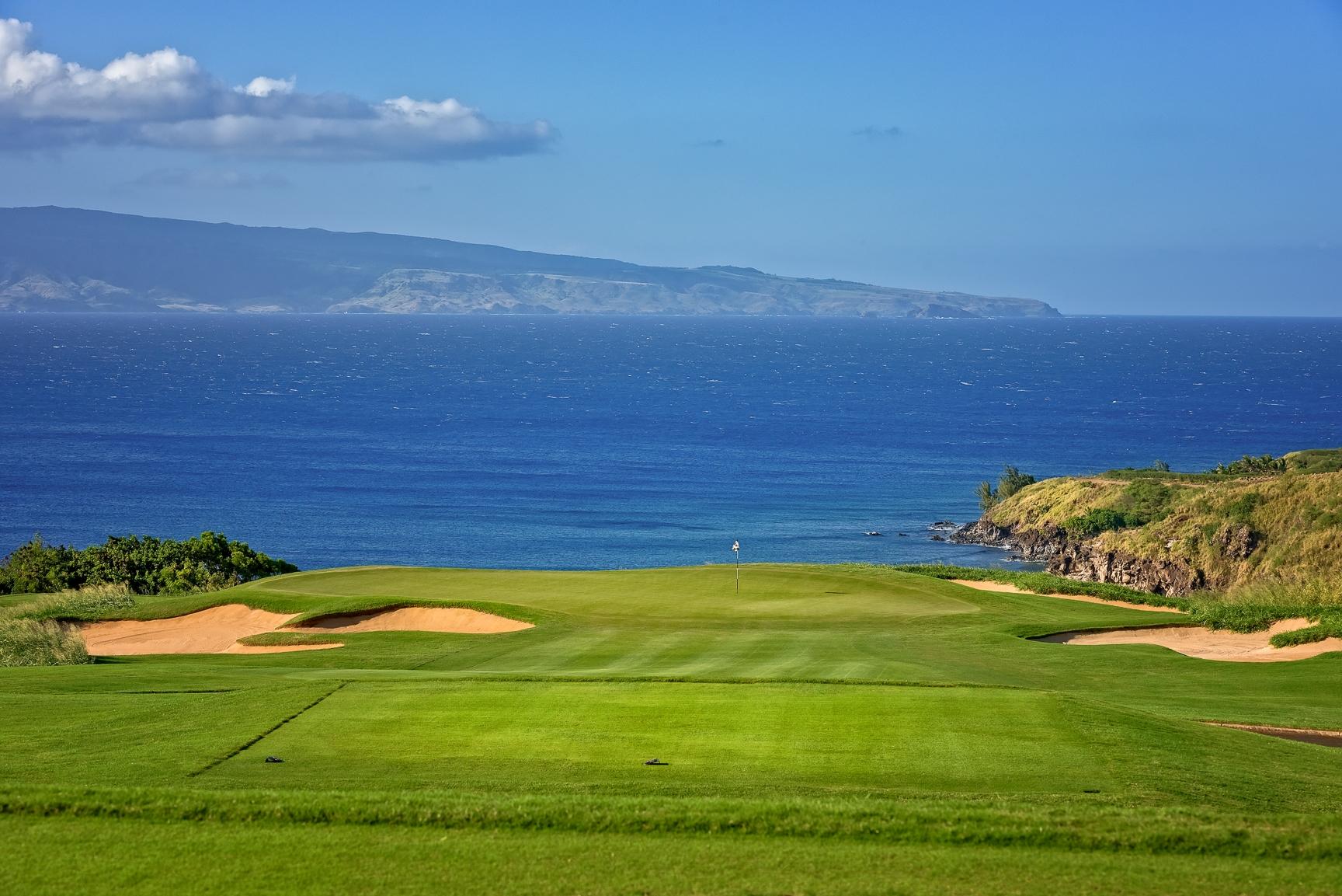 Downhill green with sea views