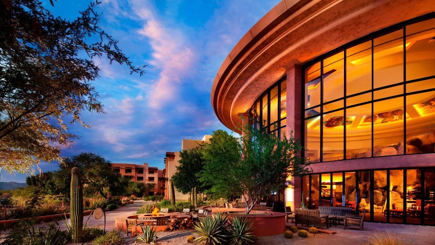 Exterior view of the Resort being lit up at evening