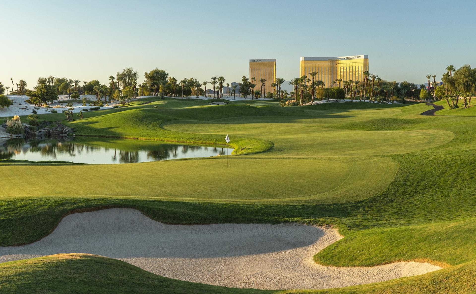 City sky scrapers towering over the Bali Hai course with its winding fairways, smooth greens and majestic palm trees
