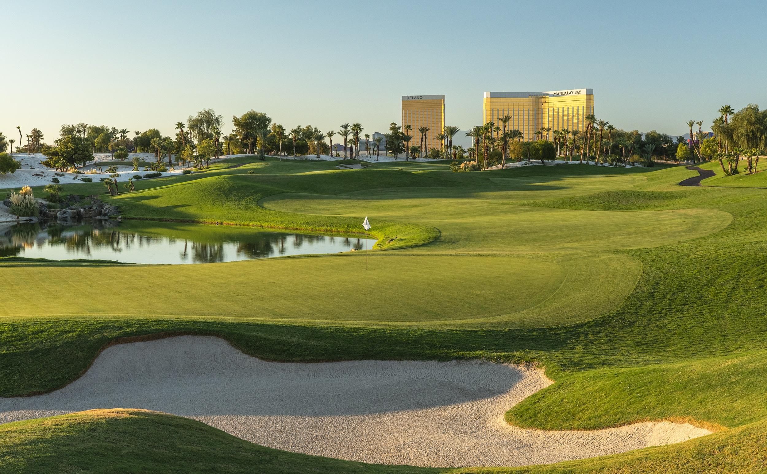 City sky scrapers towering over the Bali Hai course with its winding fairways, smooth greens and majestic palm trees