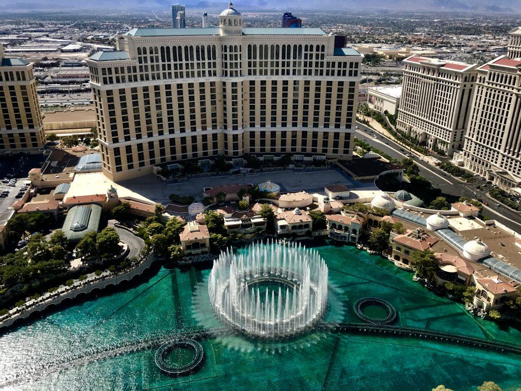 Aerial view of the Bellagio Hotel with its iconic fountain show in Las Vegas.