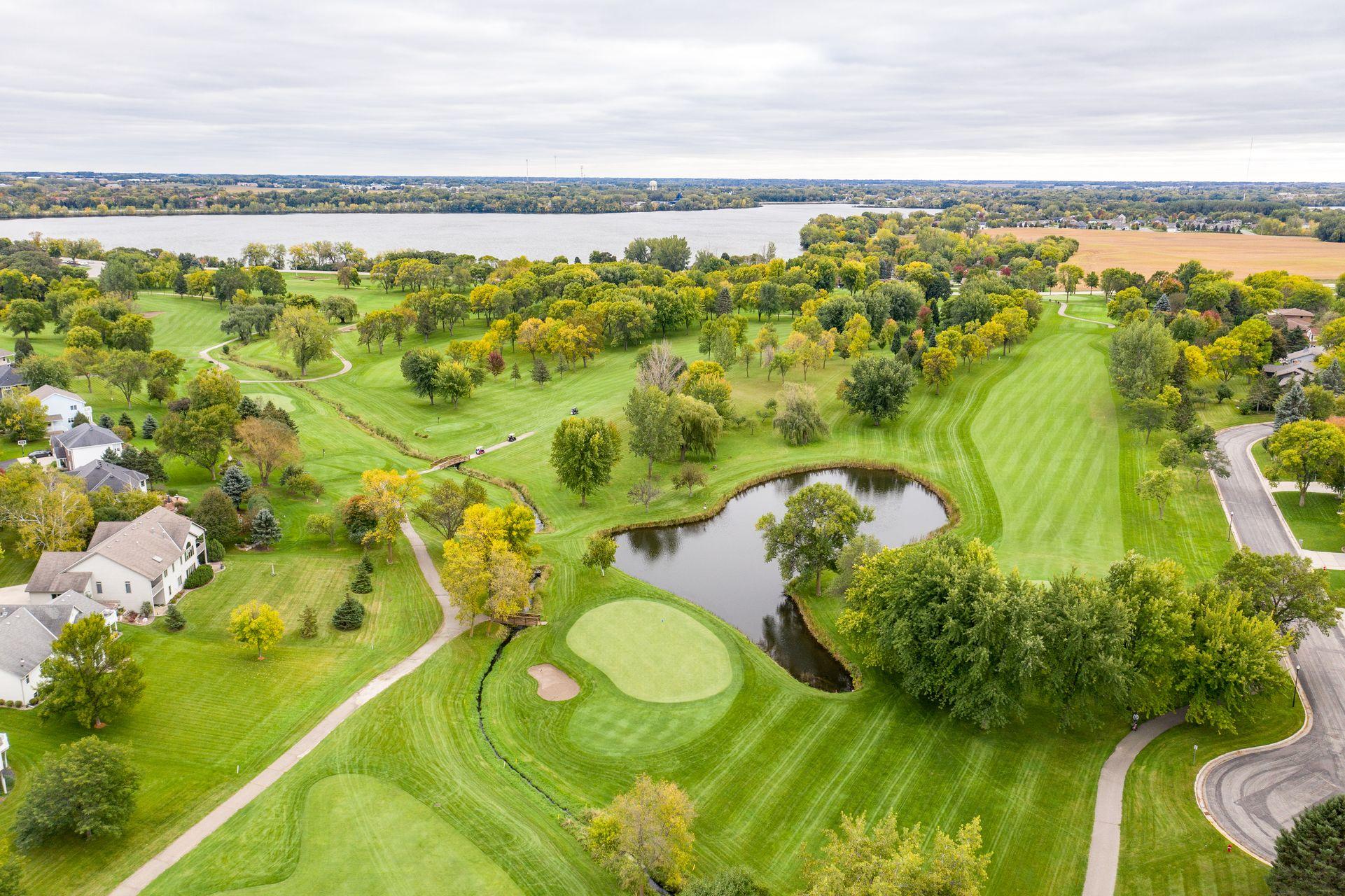 Overhead shot of the straight fairway, water hazard and sand bunkers at the Eagle Creek Golf Club