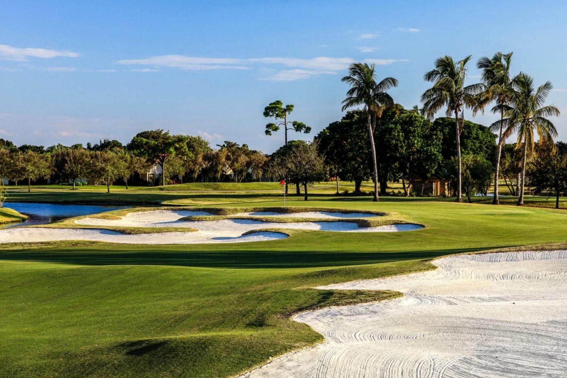 large winding sand bunkers leading to a smooth green