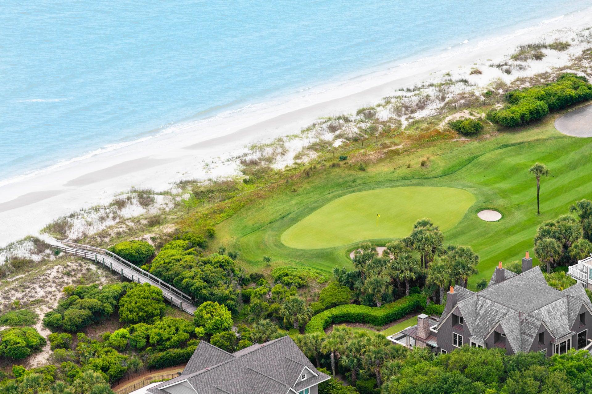 Birdseye view of a green at the Turtle Point course with ocean views