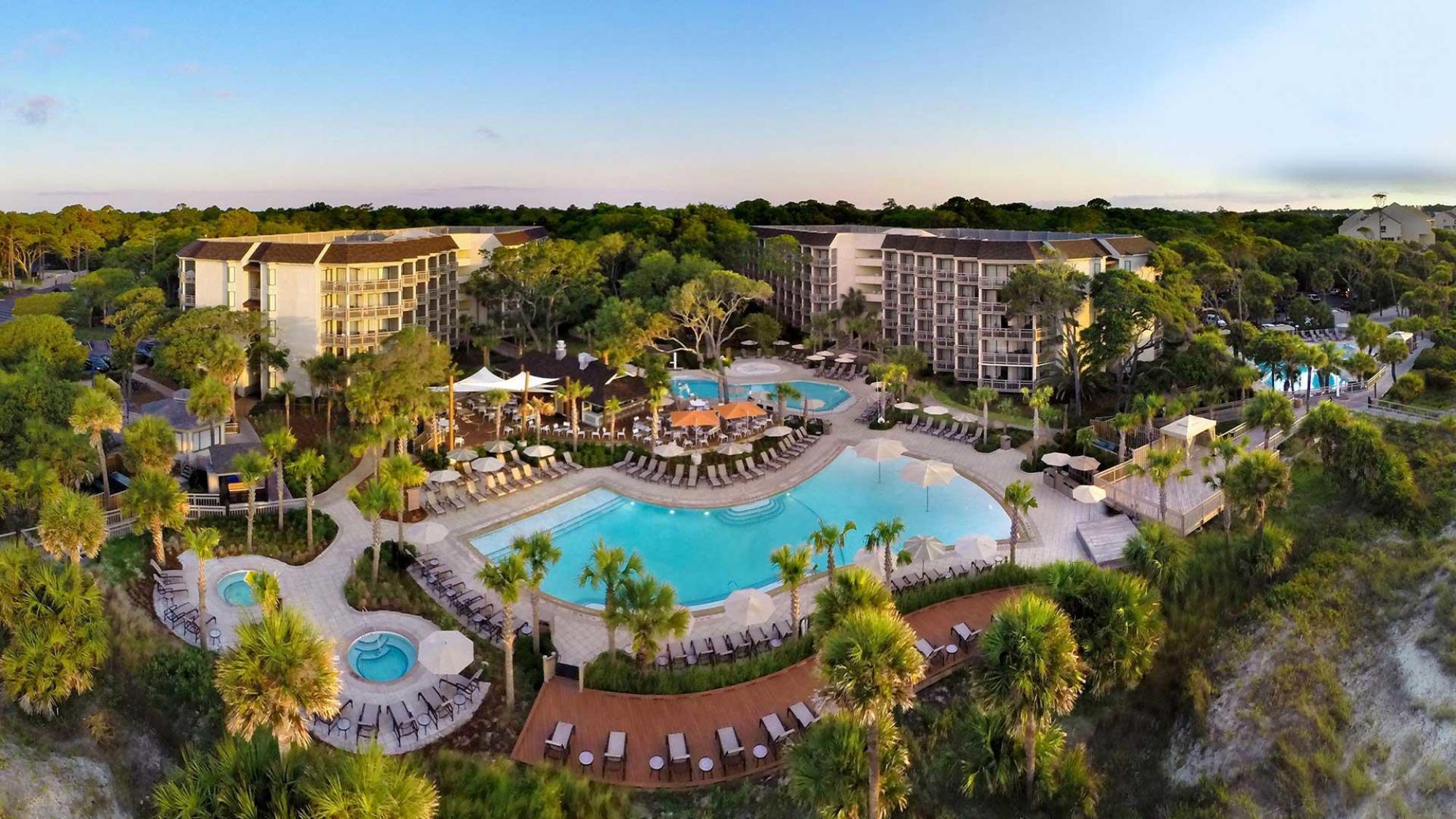Birdseye view of the outdoor swimming pools and jacuzzi's at the Omni Hilton Head Oceanfront Resort