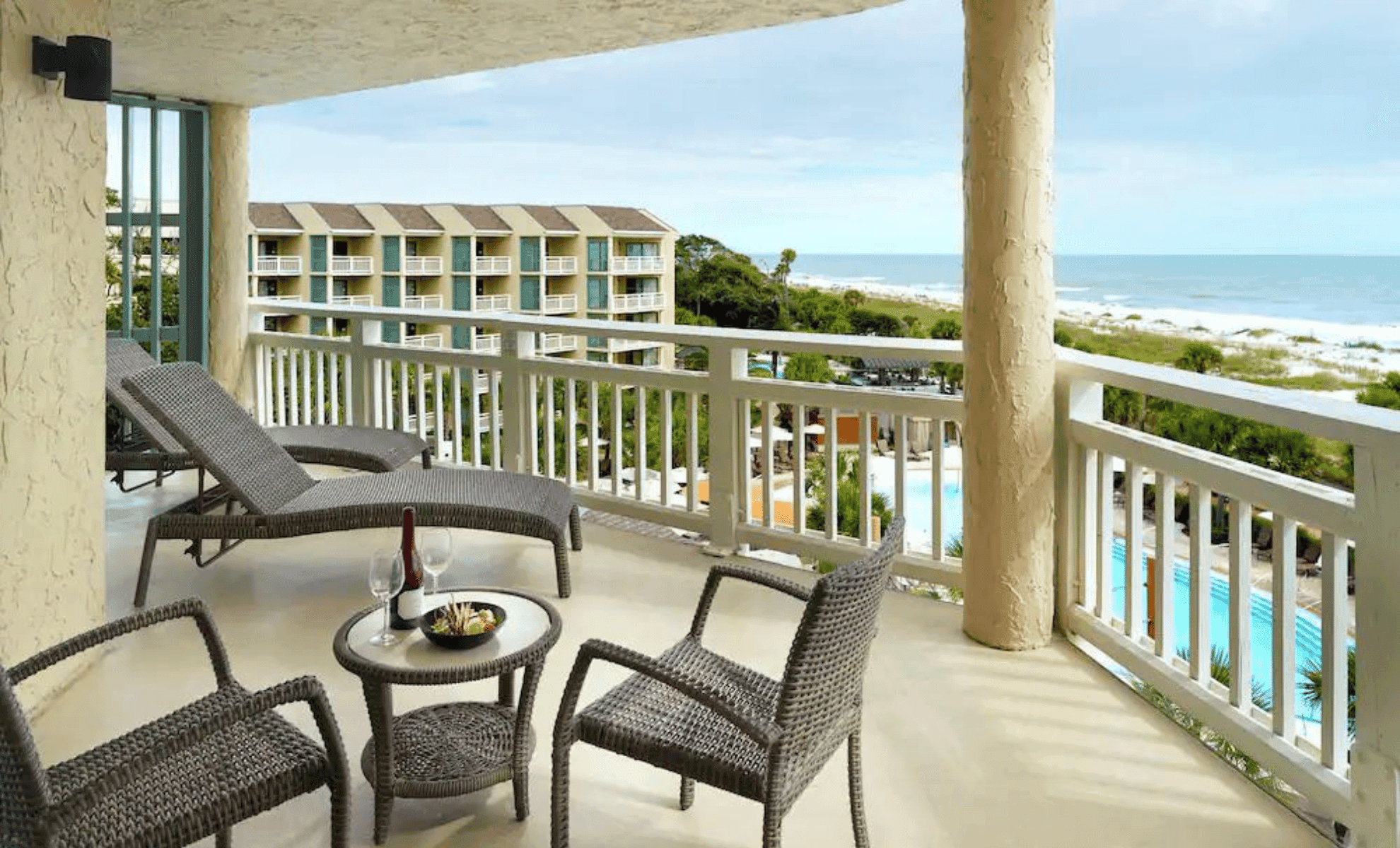 Balcony as part of a suite at the resort with sunbeds and views of the local beach