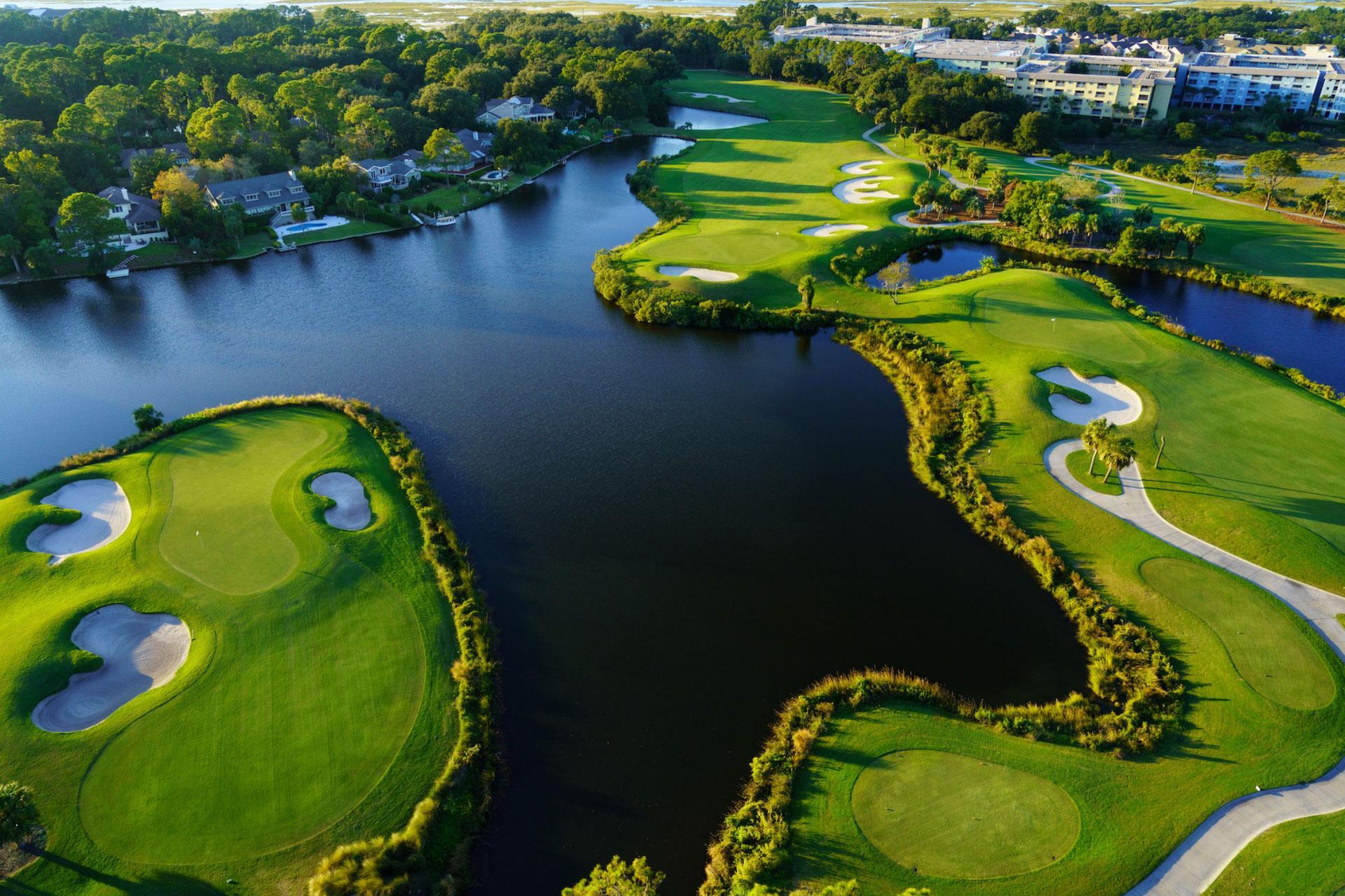 Aerial view of the Robert Trent Jones Course with a large pond in the centre