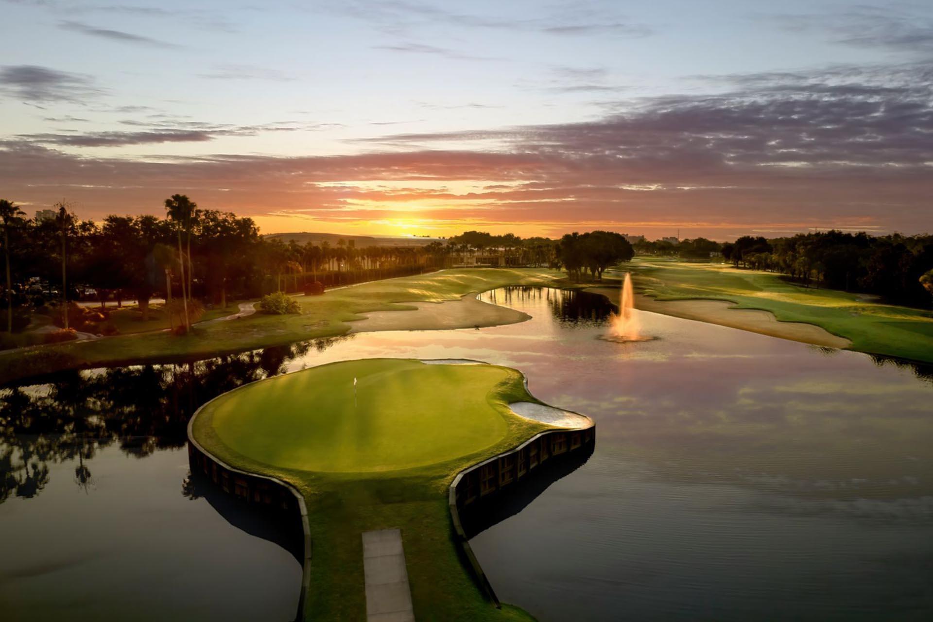 Sun setting over the Shingle Creek course with its island like green surrounded by water