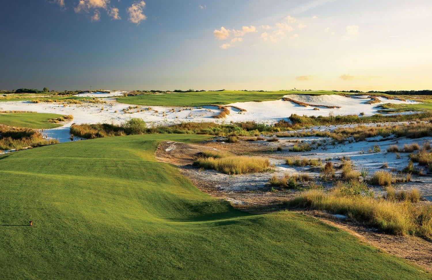 Panoramic view of the Streamsong Black course under blue skies at sun set