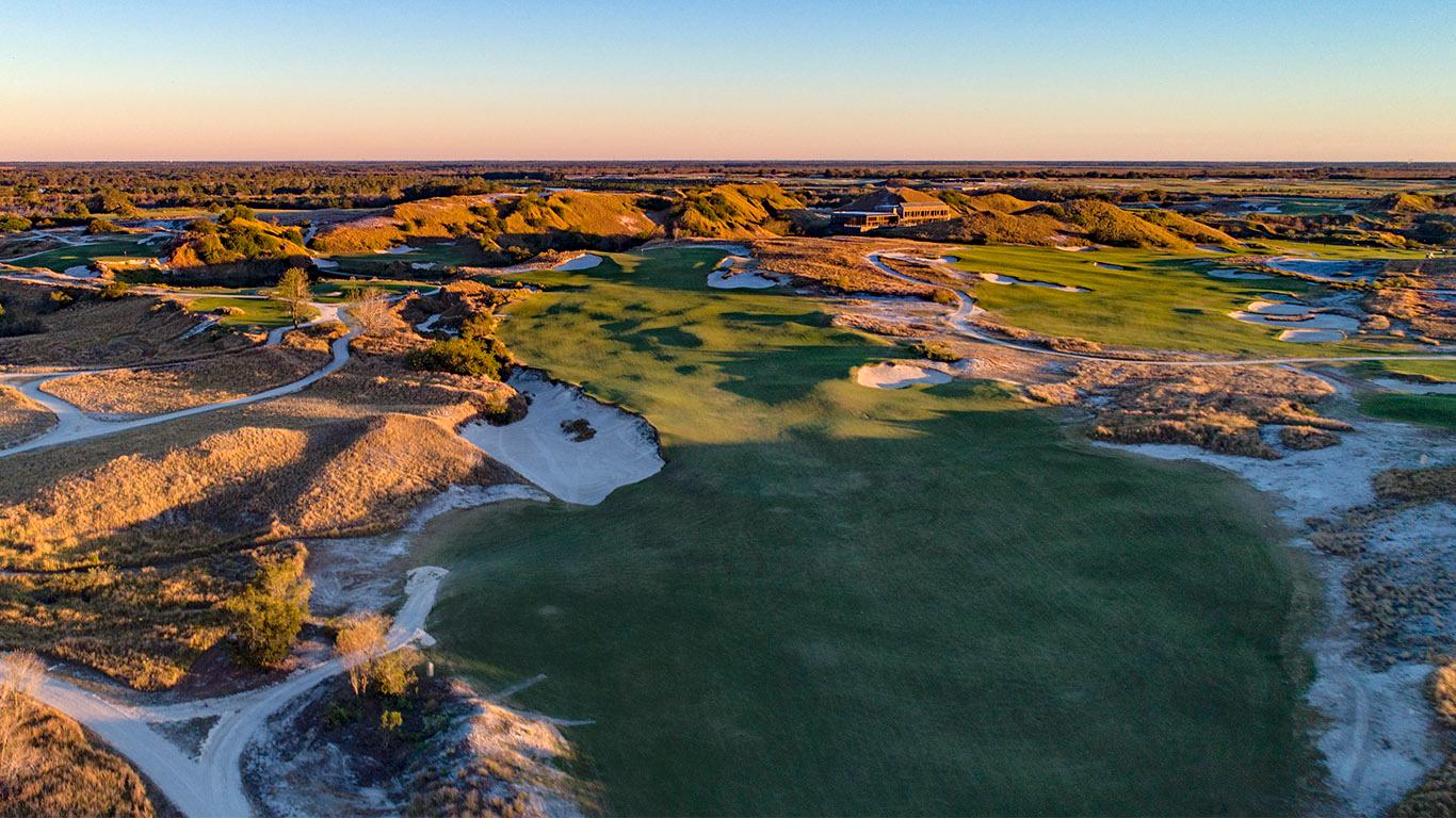 Streamsong Red’s expansive layout bathed in warm evening sunlight.