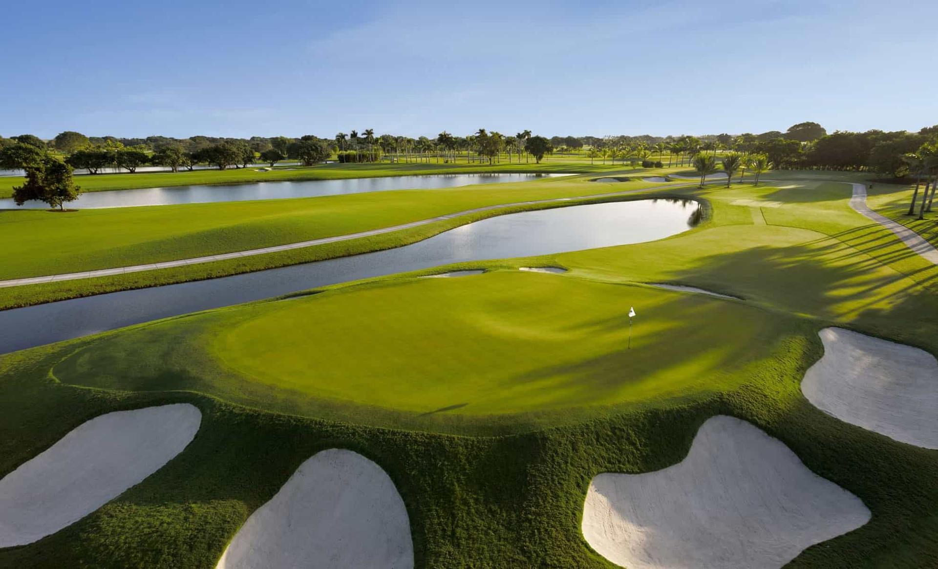 Sand bunkers surrounding an elevated green at the Trump National Doral Miami