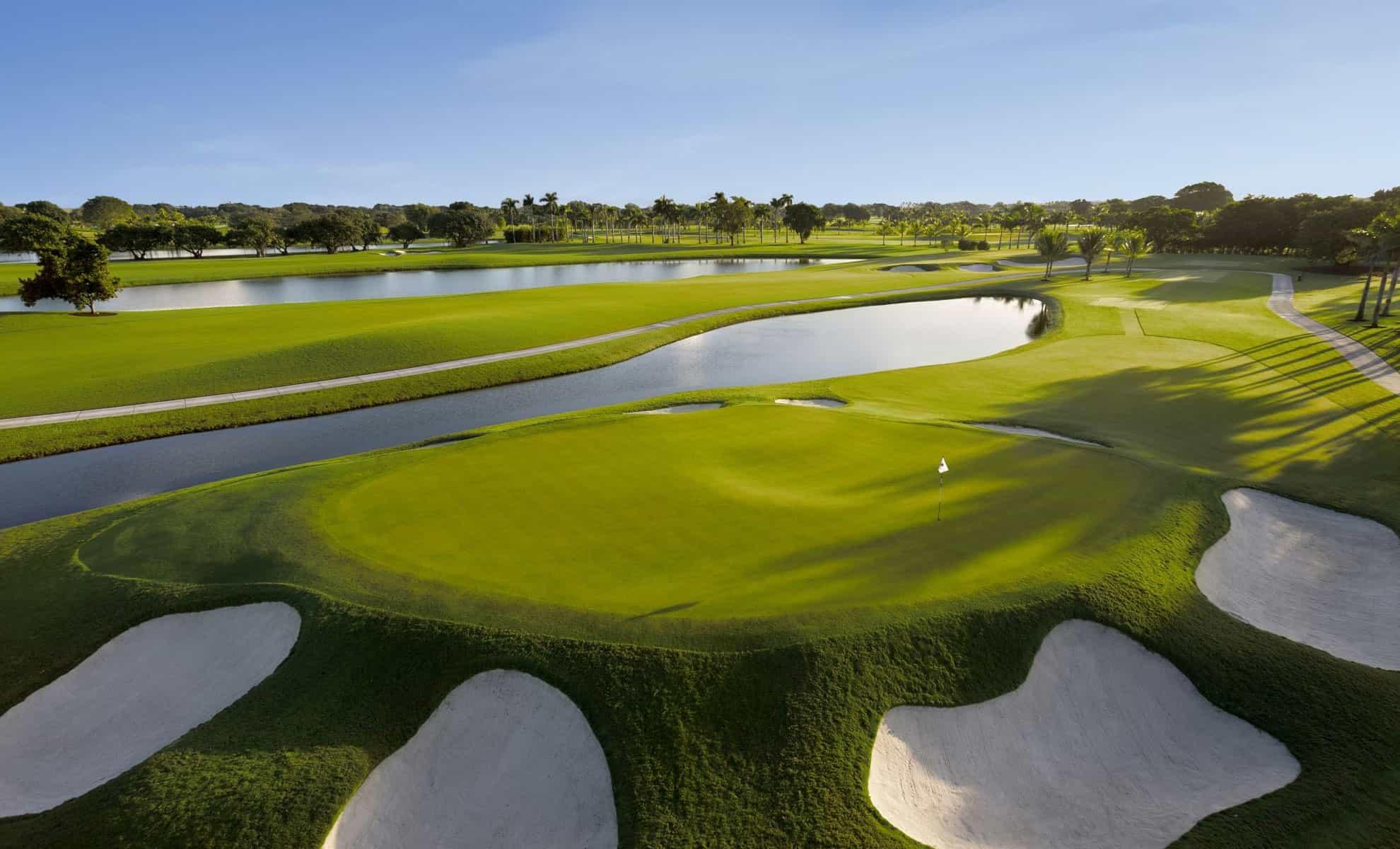 Sand bunkers surrounding an elevated green at the Trump National Doral Miami