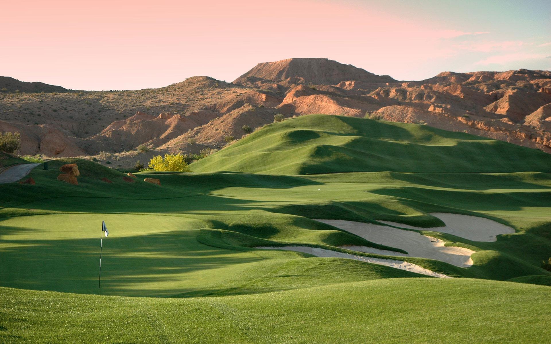 Rolling dunes leading to a smooth green with strategically placed sand bunkers