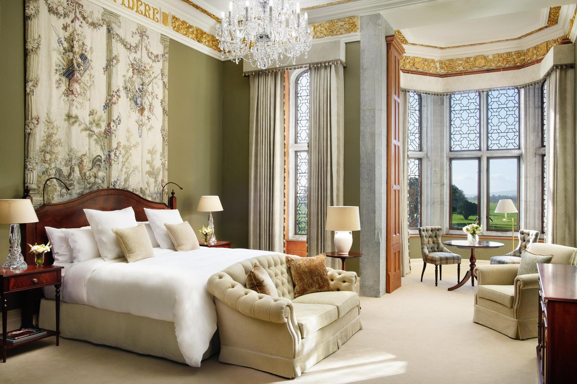 A luxurious castle suite with classic decor and golden accents.