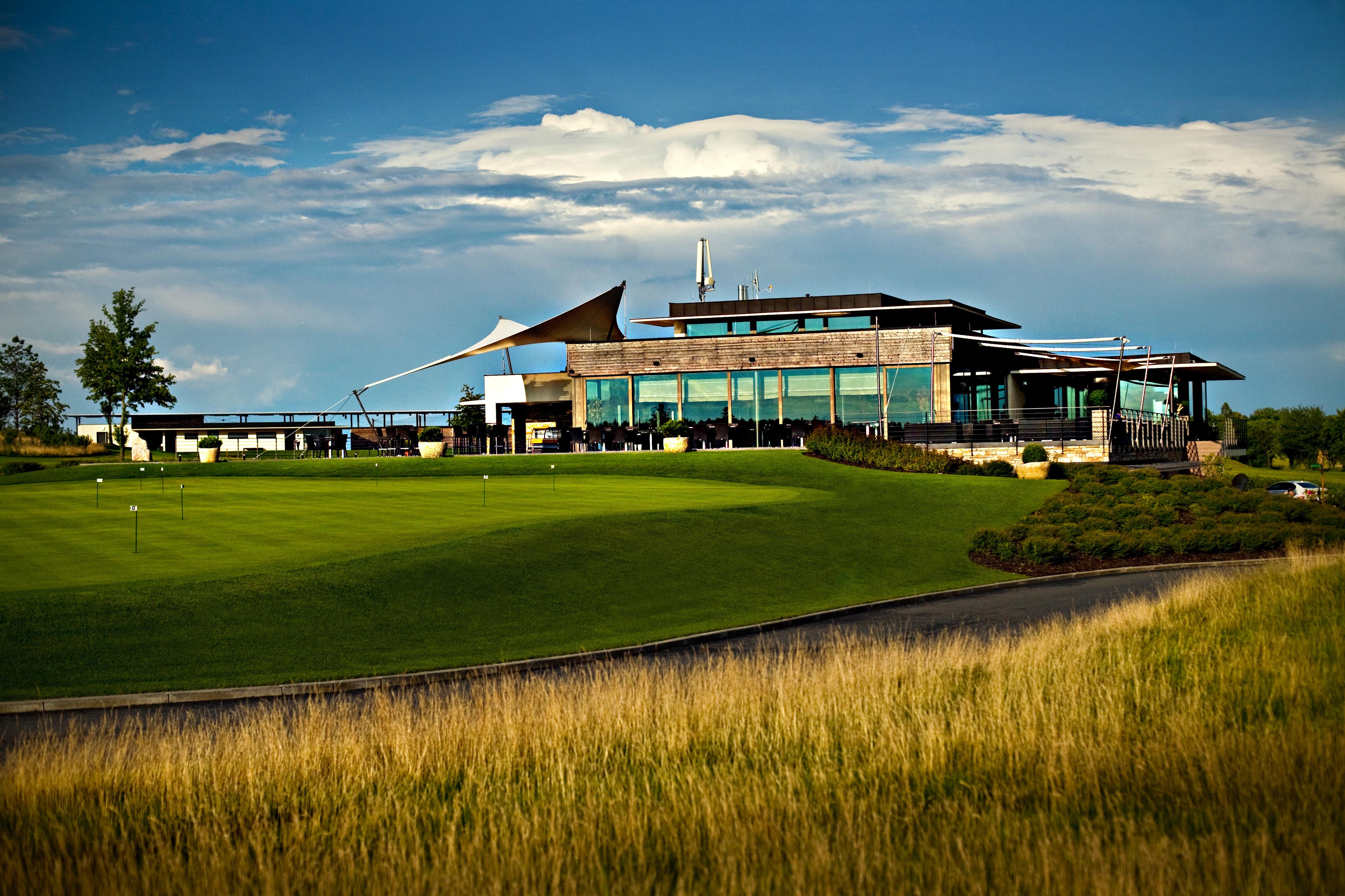The Albatross Golf Resort overlooking a practice green