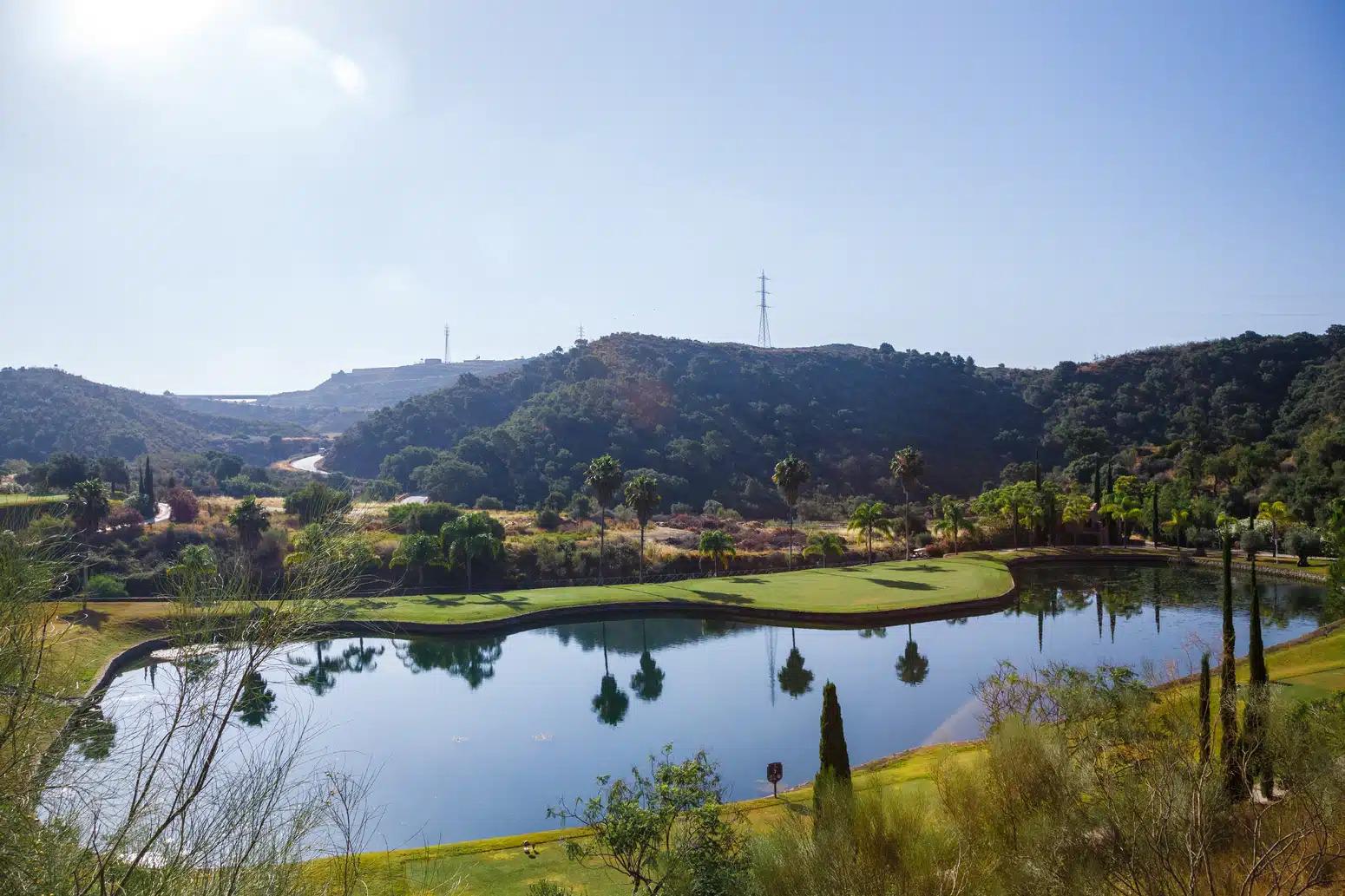 Large water hazard and blue sky