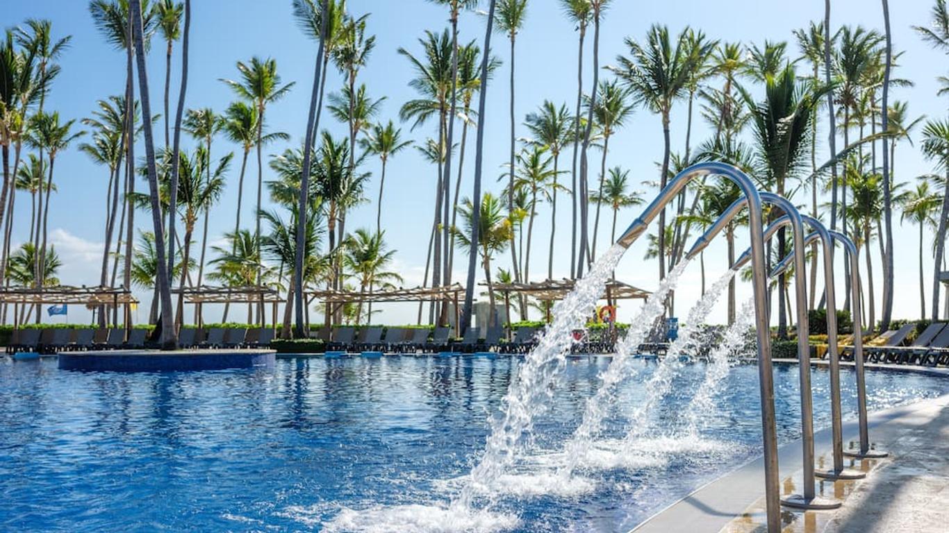 Swimming pool at the resort featuring water fountains