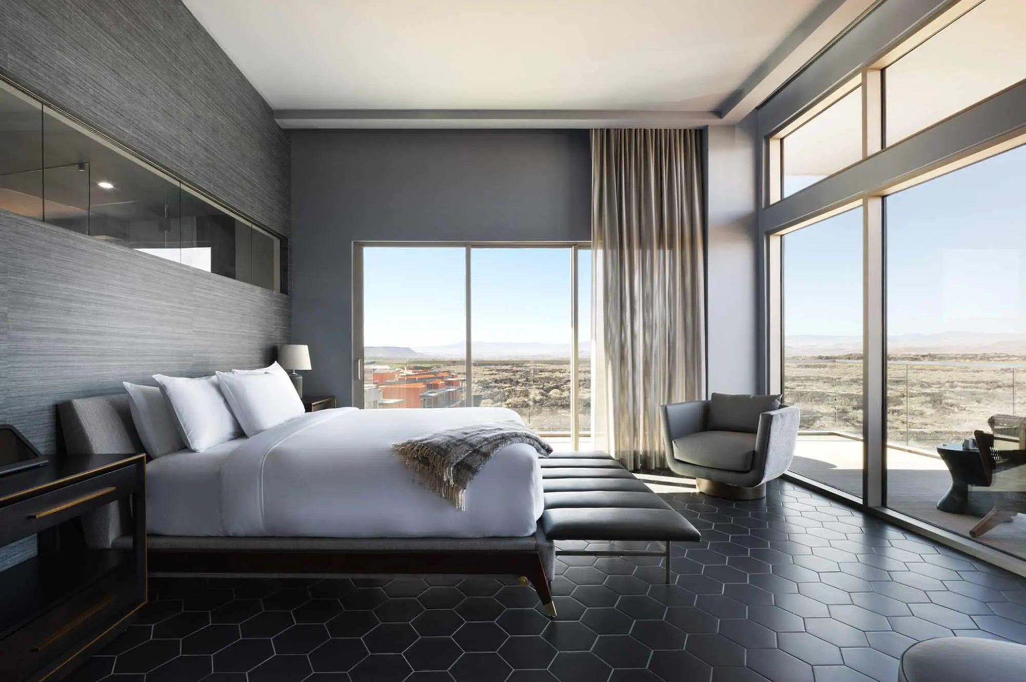 Luxurious double bedroom room with a panoramic window and balcony