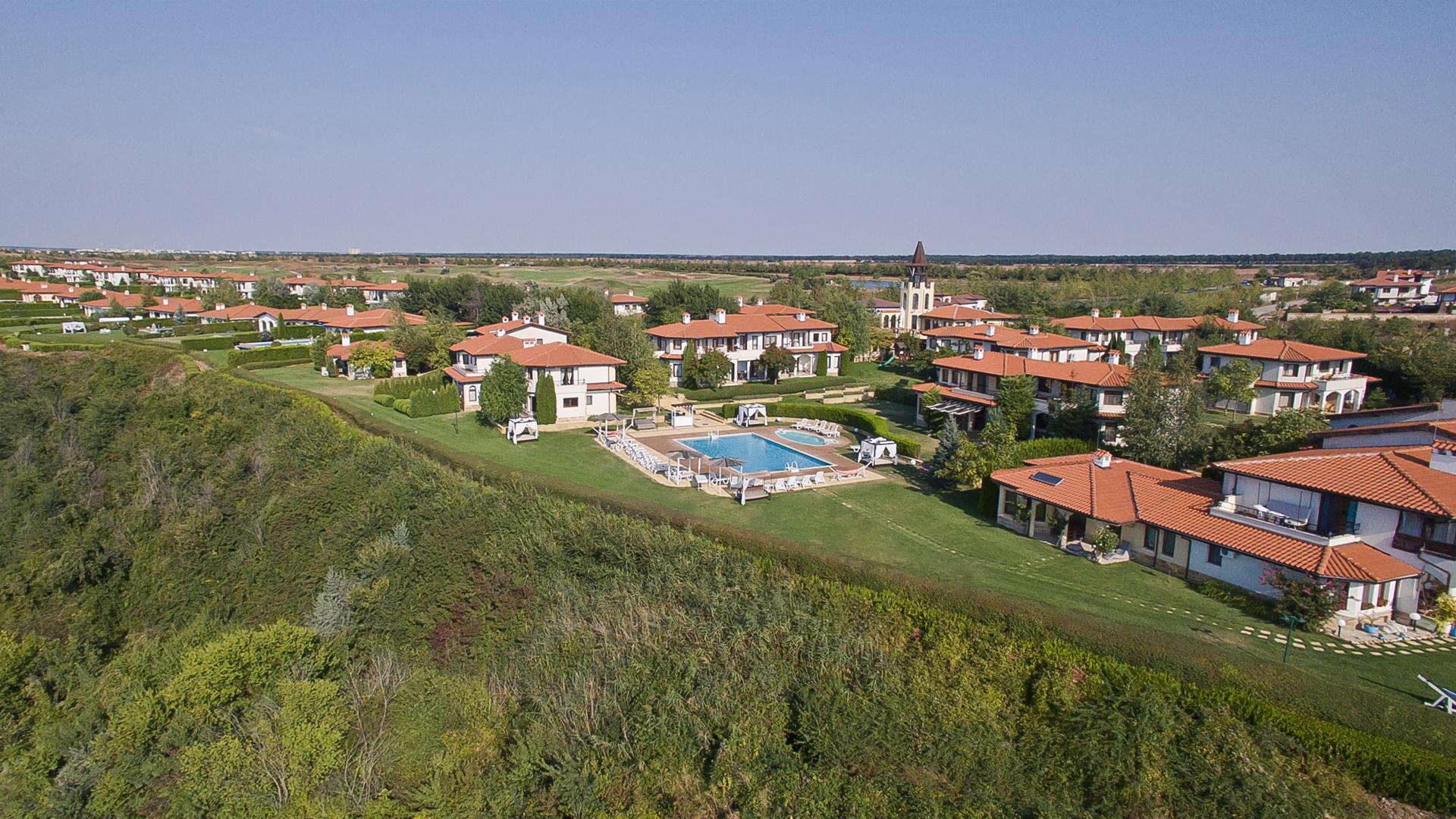 Birdseye view of the villas at BlackSeaRama Golf & Villas running down the coast following the same designs