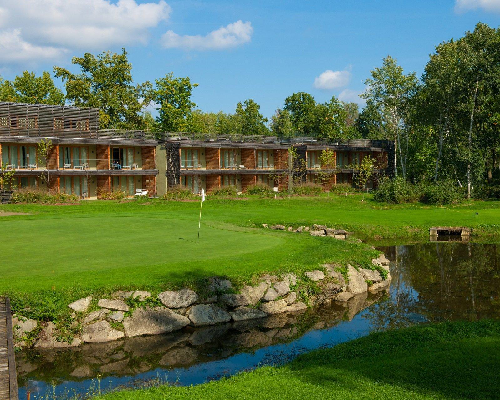 Modern accommodation beside the golf green and a peaceful pond.
