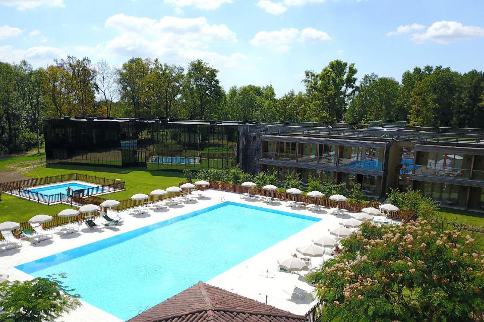 Overhead view of the outdoor swimming pool surrounded by sunbeds