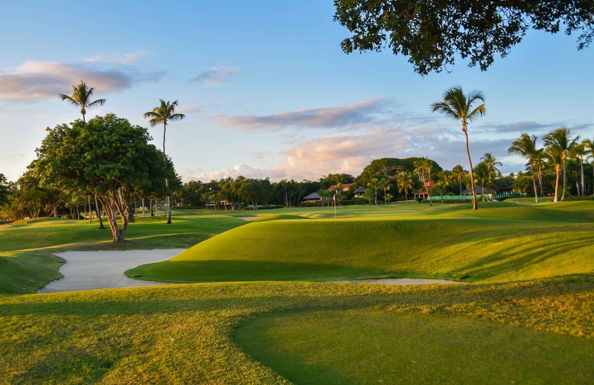 An elevated green surrounded by sand bunkers