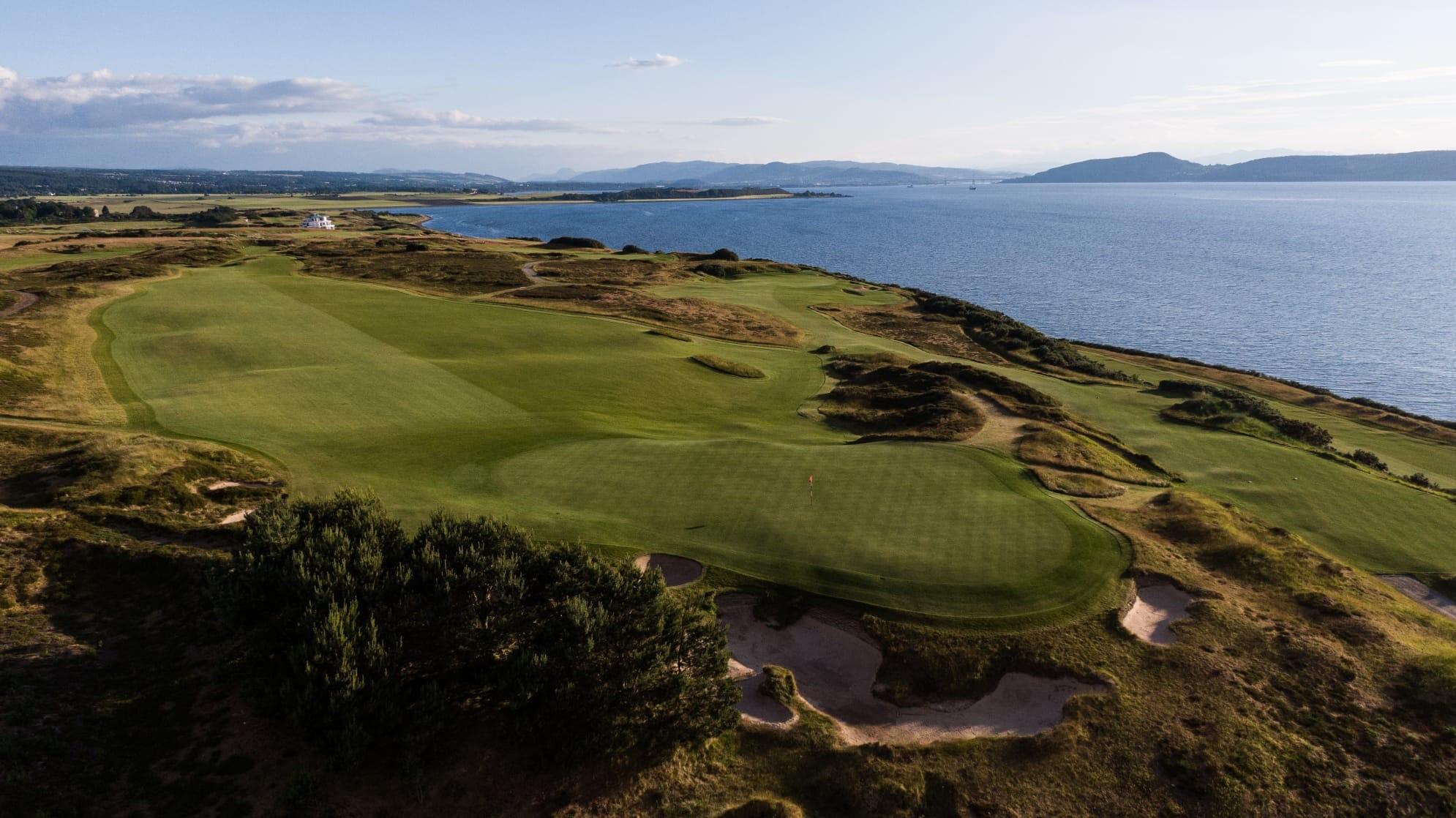 Sweeping aerial view of Castle Stuart Golf Links along the coast.