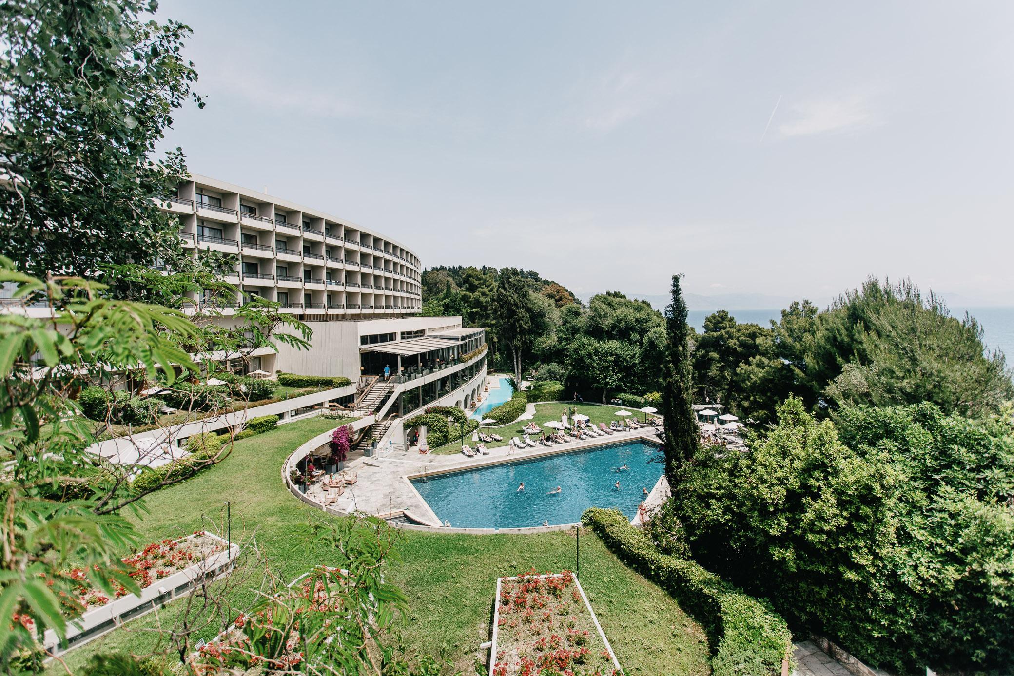 Overhead view of guests enjoying the swimming pool at the hotel