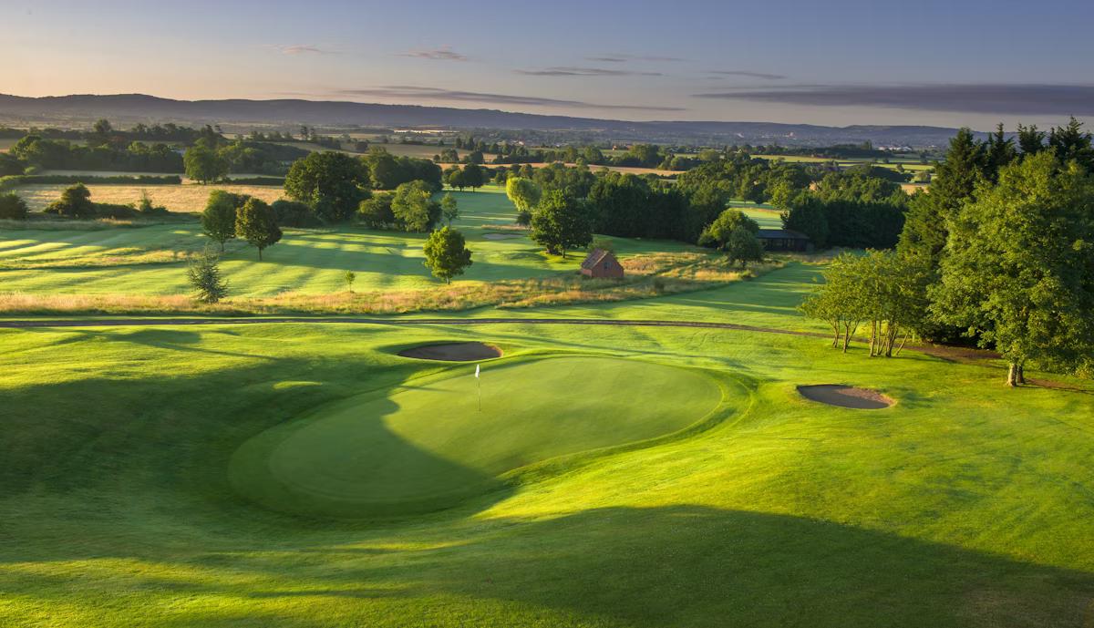 A picturesque hole surrounded by dense woodland with carefully positioned bunkers guarding the green.